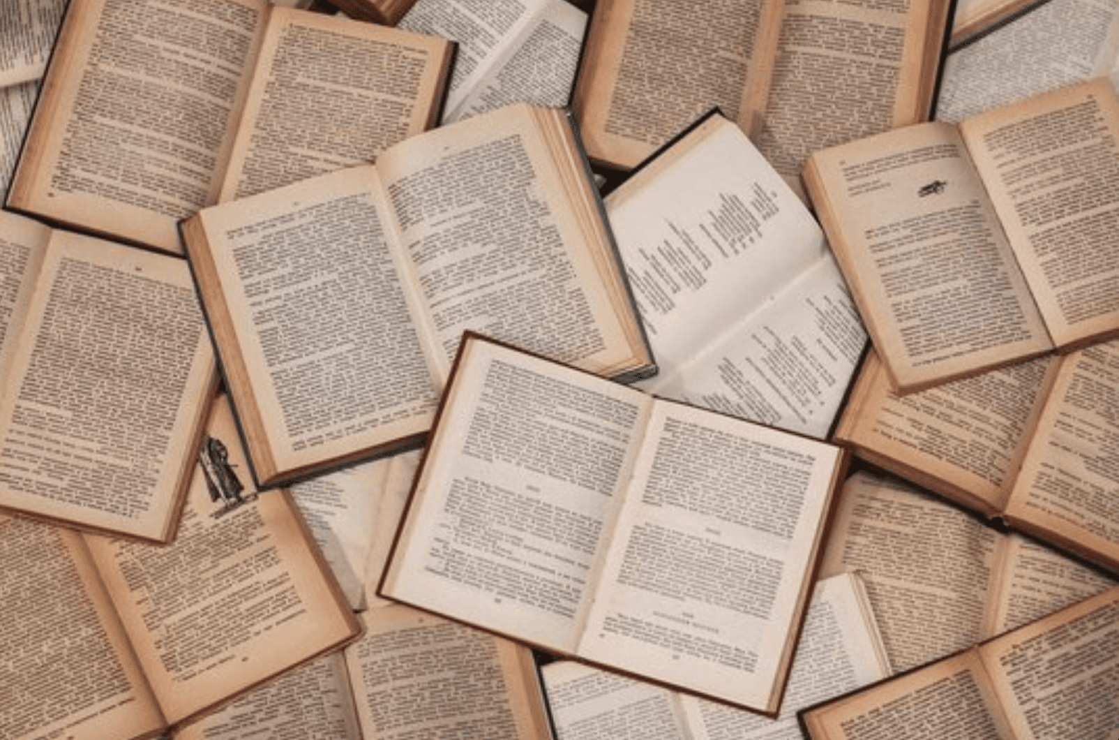 Open books spread across a table